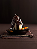 Poached pear with chocolate sauce