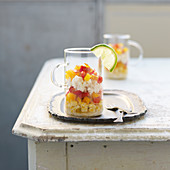 Sweet corn, crab meat and red peppers served in glass cups