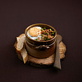 Oeuf cocotte with lamb stew