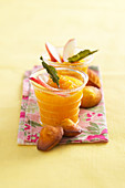 Summer fruit and verbena soup with mini Madeleines