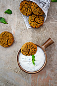 Baked falafel in a cone with a mint-yoghurt dip