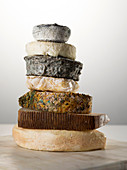 Assorted goat cheeses, stacked