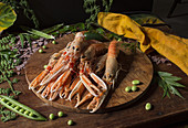 Norway lobsters on a wooden board