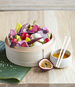 Asian vegetable salad with passion fruit sauce