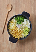 Fusilli with peas, onions and bean sprouts