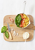 Ingredients for pasta with smoked salmon, spinach and crème fraiche