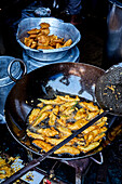 Deep-fried fritters at a market in Goa, India