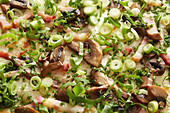 White pizza with mushrooms, bacon and spring onions (full image)