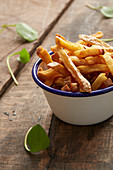 French fries in an enamel bowl