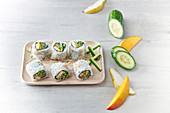 Sushi with mango, pear and cucumber