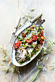 Sea bream with lemongrass, tomatoes, coriander and basil
