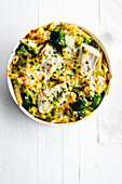 Pasta gratin with penne, white fish and broccoli