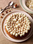 Gluten-free hazelnut cake with chestnut flour and whipped cream