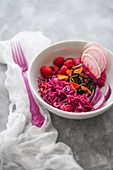 Red salad with vegetables and raspberries