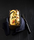 Savoury box cake with bacon and plums