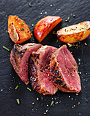 Duck breast with grilled peaches