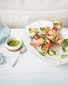 Shrimp skewers, herb dressing sauce