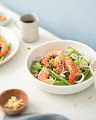 Sautéed shrimp with green vegetables