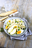 Celery salad with apples and hard-boiled eggs