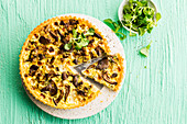 Quiche with oysters, mushrooms, leeks and cheese