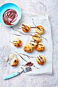Coconut macaroons with chocolate icing