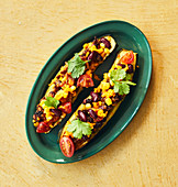 Courgette boats stuffed with beans, tomatoes, beef and cheddar cheese