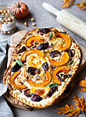 Tarte flambée with butternut squash, candied red onions and goat's cheese