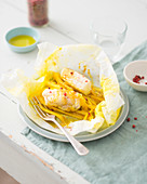 Monkfish in paper with fennel and turmeric