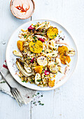 Roasted winter vegetables on cracked wheat