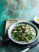 Potato salad with broad beans, mesclun and goutweed
