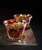 Apple and raspberry compote with crumbles