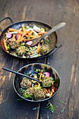 Buckwheat dumplings with courgettes and herbs served with vegetables
