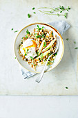 Ebly lentil risotto with asparagus and boiled eggs