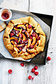 Peach,raspberry and quince jelly tart