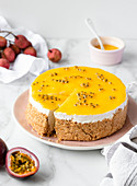Cook-free cheesecake with mango and passionfruit coulis