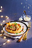 Christmas puff pastry tart with foie gras and boudin