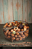 Basket of walnuts and physalis