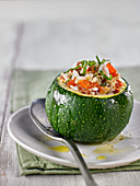 Round courgette stuffed with rice and vegetables