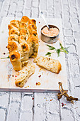 Pull apart bread with dill, served with salmon cream