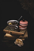 Raspberry and hibiscus macaroons and cup of tea