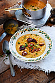 Orange lentils with cumin and grilled chorizo