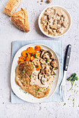 Vegetarian seitan escalope with mushrooms,carrots and arsley
