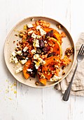 Risotto with squash, beet and feta cheese