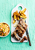 Ribs with potatoes and coleslaw