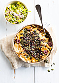 Mac & cheese with olives and pumpkin seeds