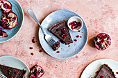 Bitter dark chocolate and pomegranate tart