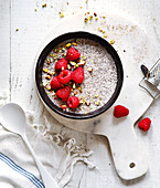 Chia pudding with raspberries and pistachios
