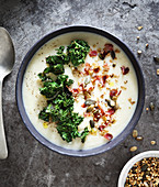 Creamy parsnip soup,grilled bacon and kale cabbage crisps