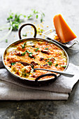 Cauliflower gratin with mussels and mimolette