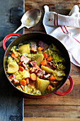 Potato and cabbage stew with bacon